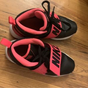 Nike running shoes pink and black